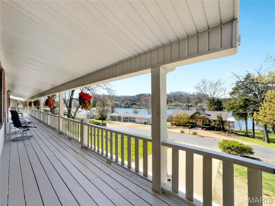 Phenomenal view of the lake from this 4-bedroom 3-bath home in desirable Normac Estates just off Hwy 54 in Camdenton, MO. Just across the bridge are two of the lake's premier golf courses and several restaurants. This well-cared-for home has a new roof, HVAC system, windows, and sliding doors. Covered front porch and a screened-in porch so you can comfortably sit and look out over the lake to watch the activity or just to watch the sunset. A 10x28 dock slip in the community dock, just a block or so away, is included. Black-topped roads throughout the subdivision. This is a truly must-see home. Call to set up your private showing before this one gets away. Interior pictures coming soon.