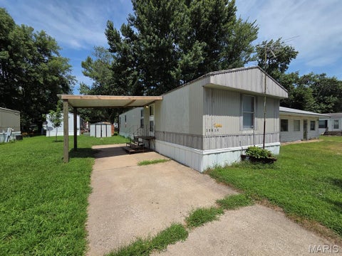 Photo of 32810 Violet Street #58, La Grange, MO 63448 (MLS # 26046973)