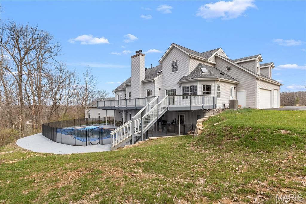 Photo of 4118 Harbor Towne Drive, High Ridge, MO 63049 (MLS # 26015550)