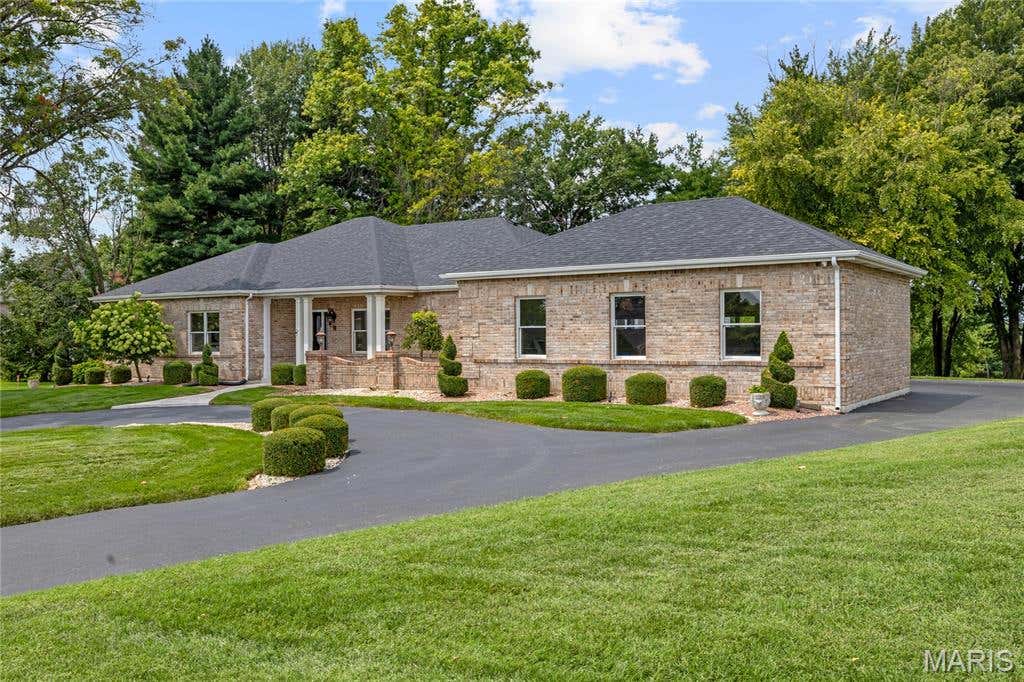 Photo of 63 Leinster Hill Lane, Weldon Spring, MO 63304 (MLS # 26036842)