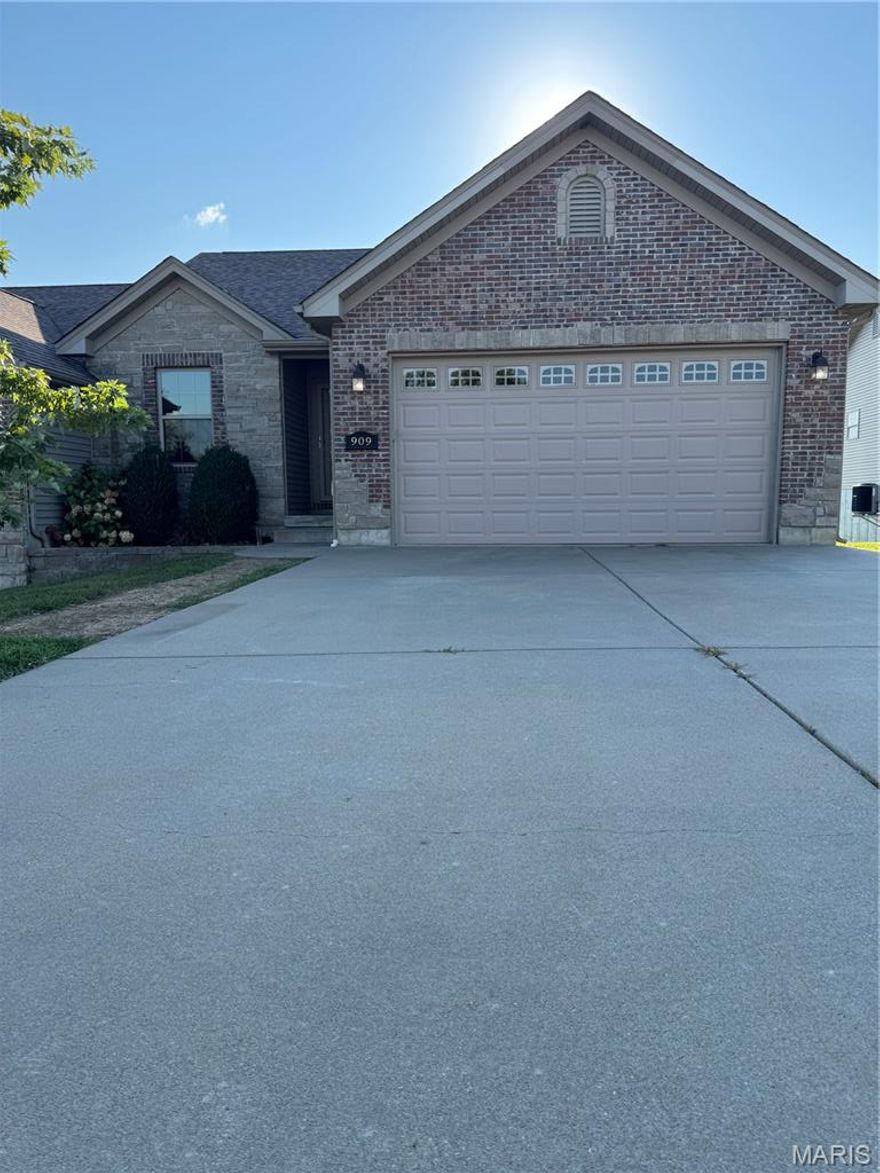 No Fault of Seller! Back on the market! Spacious living and low-maintenance is just the beginning of what you will find in this one owner villa. Over 1800 sq ft of living space with open concept is what you will find when you walk in the front door. On the main floor you will find kitchen, living and dining. Also find the master suite with soaker tub and separate shower. Second bedroom, hall bath and laundry finish out the main floor. Downstairs you will find a 3rd bedroom, secondary living room and full bath with another set  of laundry hookups in the storage area. The basement walks out to a nice concrete patio for entertaining. Plenty of storage exists in the garage with shelving that is staying. Quiet neighborhood, cul de sac, no mowing grass or shoveling snow. Schedule a showing today.