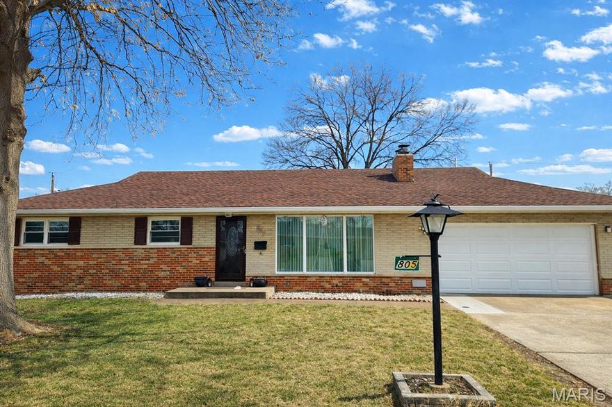 This beautifully maintained ranch home with a newer roof offers an inviting open floor plan with three spacious bedrooms on the main floor and a fourth bonus room in the finished lower level, perfect for a home office, guest space, or workout area. Rich hardwood floors run throughout the main living areas, and the family room features a cozy wood-burning fireplace with a classic brick surround that has been modernized. The custom kitchen is designed for both style and function, showcasing granite countertops, a stone backsplash, and a convenient breakfast bar that flows seamlessly into the dining area. An updated bathroom adds modern appeal, while the finished lower level provides additional recreation and living space. Completing the home is a two-car garage and a large, level backyard with a patio, ideal for outdoor entertaining and everyday enjoyment.