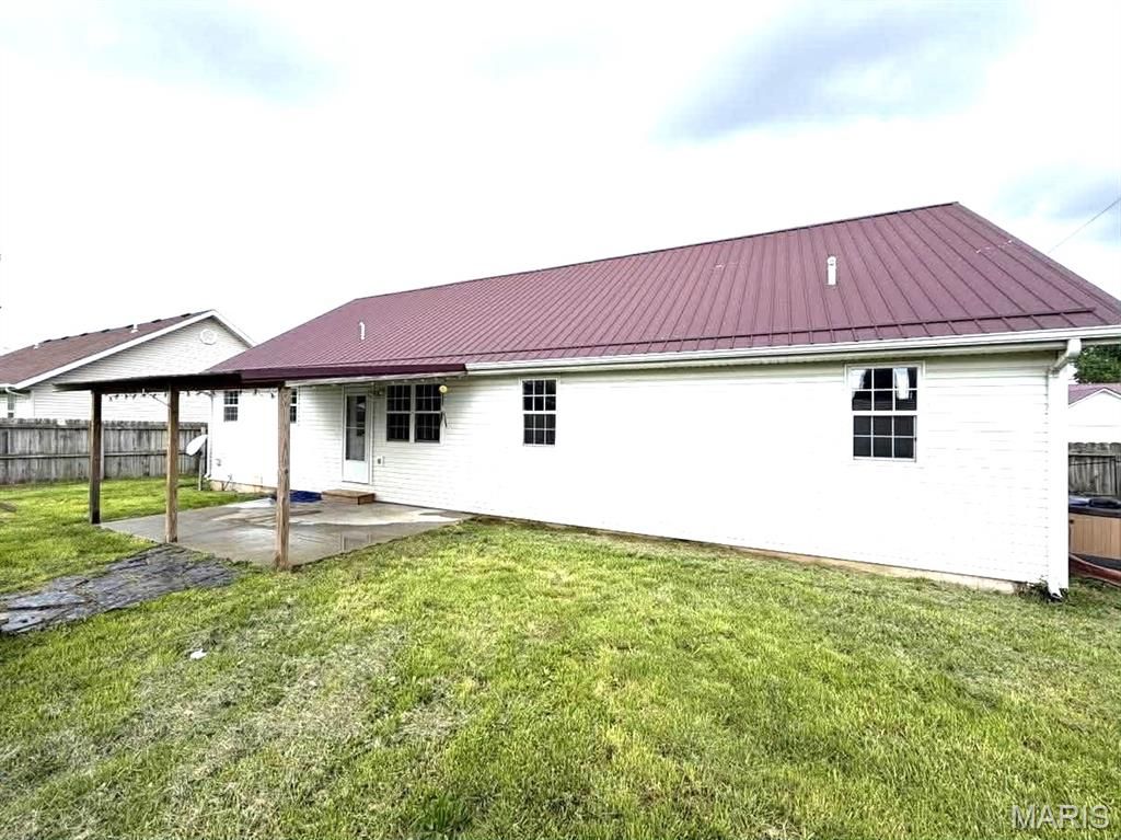 Photo of 1228 LACY DR, Lebanon, MO 65536 (MLS # 26023924)