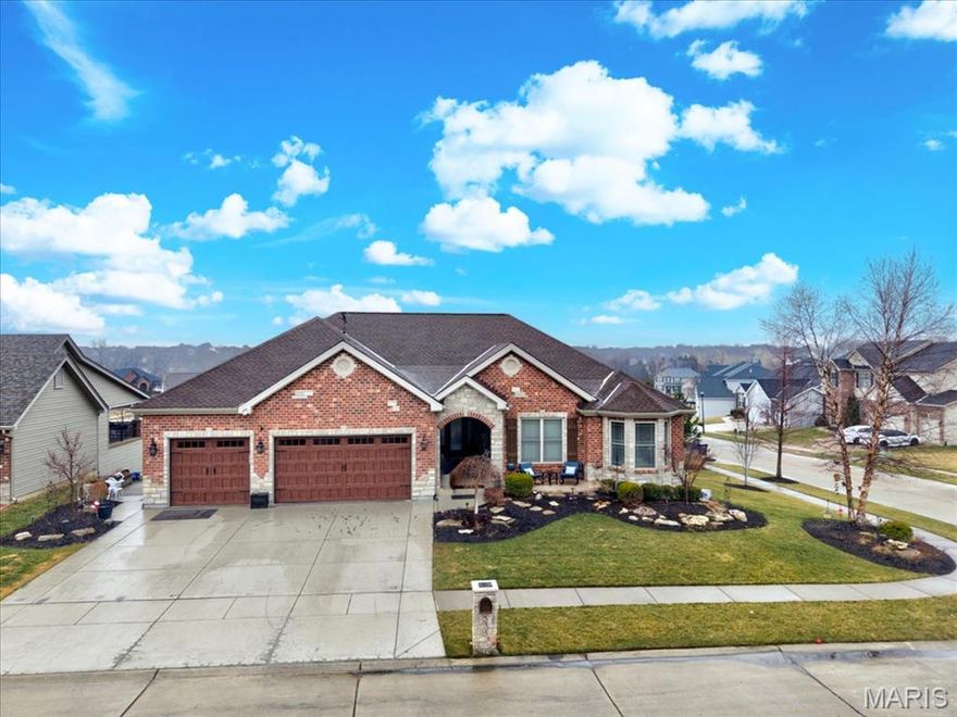 Welcome to this stunning custom-built ranch-style home in the desirable Stonemoor subdivision in Wentzville, Missouri.
Offering 5 bedrooms and 3.5 bathrooms, this home blends space, style, and functionality throughout. The main floor features an open concept layout perfect for entertaining, highlighted by a chef’s kitchen with a walk-in pantry, generous counter space, and seamless flow into the living and dining areas. Spacious bedrooms with walk-in closets provide excellent storage and comfortable living spaces. Step outside to the large deck with newer stairs leading to the backyard, where you'll find a cozy outdoor fire pit area perfect for relaxing or entertaining. The finished lower level expands the living space with additional bedrooms and a full bathroom, well suited for recreation, guests, or a home office. Additional highlights include a newer roof, 3-car garage, and thoughtful custom updates throughout. Residents can also enjoy the neighborhood pool during the summer months.
This home offers an excellent opportunity in one of Wentzville’s most sought-after communities.