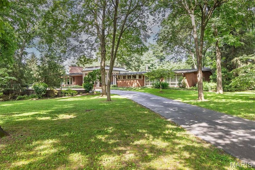 Wonderful mid-century modern on 3+ acres in the heart of Ladue. Fabulous primary suite plus three other bedrooms (with possible 5th) White kitchen and breakfast room open to lovely salt water pool, refurbished in 2022 by Westport Pool. Inviting covered outdoor eating area offers built-in grill & bar. Partially finished LL with top of the line wine cellar, sleeping area, full bath and tons of storage. A beautiful copper roof plus a full generator completes this Ladue gem!