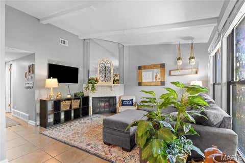 Photo of 1076 Mersey Bend Drive, Oakville, MO 63129 (MLS # 26038545)