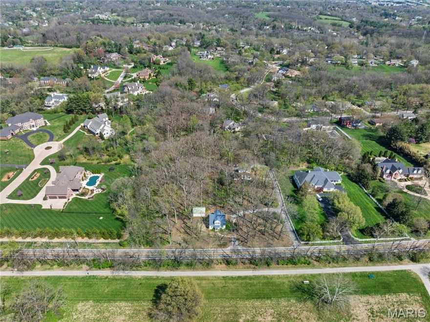 Back on Market - No fault of Sellers! | Outstanding opportunity to build your dream home on a 3.24 acre lot or to rehab the 2 existing homes on the property! The property is in the Estate Zoning District which means that each residential lot must be at least 1.8 acres, so it cannot be split. (The 2 homes on the property, front and back, are grandfathered in). Beautifully virgin wooded and very private. Being sold with existing homes "as is" but they have very livable utilities (gas, water, electric, sewer & cable). Front home (built in 1941, 1,344 s.f.) has 4 beds, 2 baths, living room, kitchen, & back porch w/ detached garage. Back home (built in 1973, 2172 s.f.) is 2 sty, 3 beds, 2.5 baths, living room, dining room, kitchen, family room, main floor office, 2 car garage. There is a 35' easement along the south property line for the asphalt driveway. Total frontage is 306 ft./470 ft deep. Homes are occupied. Do not walk or drive on the property without an appt.This is a duplicate listing # 25022319
