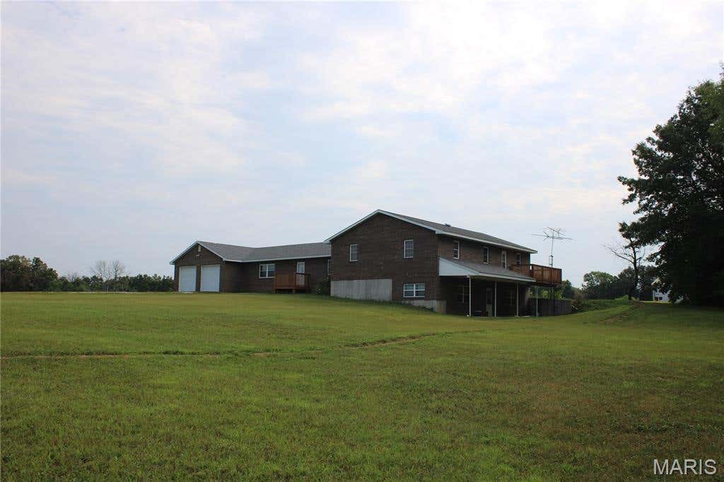 Photo of 12818 Monroe Road 633, Santa Fe, MO 65282 (MLS # 26047778)