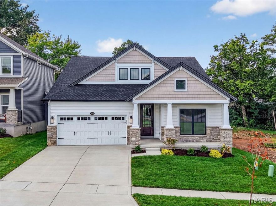 MOVE IN READY! New Construction by Fischer and Frichtel in the rapidly selling Ryehill Manor neighborhood in St. Peters. The exterior is impressive with a partial stone facade, large front porch, vinyl siding with shake accent, carriage style garage door, added width driveway, 8 ft tall front door, architectural shingles, full yard sod, landscape and lawn irrigation. Features inc 3 bedrooms, 2.5 baths, 1,889 sq ft of open living space, luxury vinyl plank flooring, 12 ft ceilings in the Kitchen-Brkfst Rm-Great Rm, 9 ft ceilings in the balance of the main floor, 5.25 tall base trim, window wall in the Great Room and Primary Suite, island with seating bar, 42  Inch cabinets with crown, custom cabinet features, roll out shelving, soft close, trash can pull out, quartz countertops, tile backsplash, under cabinet lighting, st steel appliances, gas range, chimney style range hood, transom windows in the Great Room and 2 full bathrooms, 2 panel doors, main floor laundry, marble shower in the Primary Bath, raised height double bowl vanities in the Primary Bath, walk in closet, raised height vanity in the guest bath, 12x12 composite deck and a 14x12 patio for outdoor enjoyment. The lower level has a bath rough-in and egress window for an easy future finish if desired. This single entrance neighborhood offers easy access to Hwys 70, 370, shopping, restaurants, services and The St. Peters Rec Plex. Residents will receive a 3 year paid membership to the spectacular St. Peters Rec Plex.