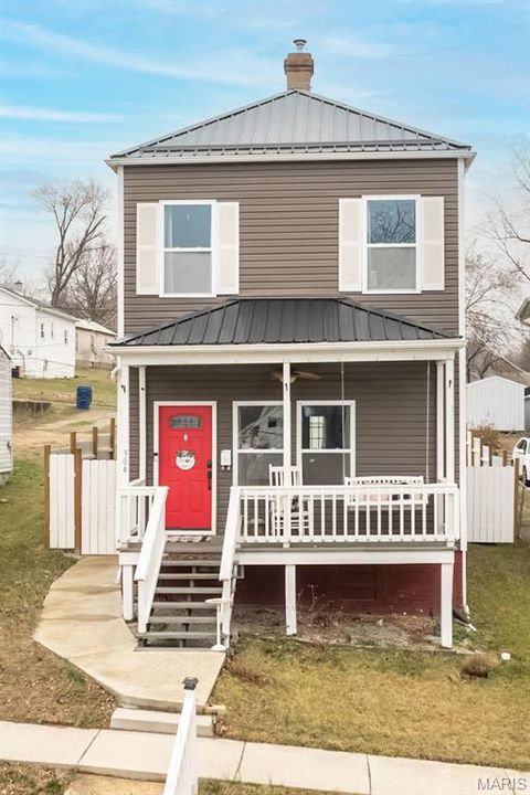 Photo of 904 N 2nd Street, De Soto, MO 63020 (MLS # 26012028)