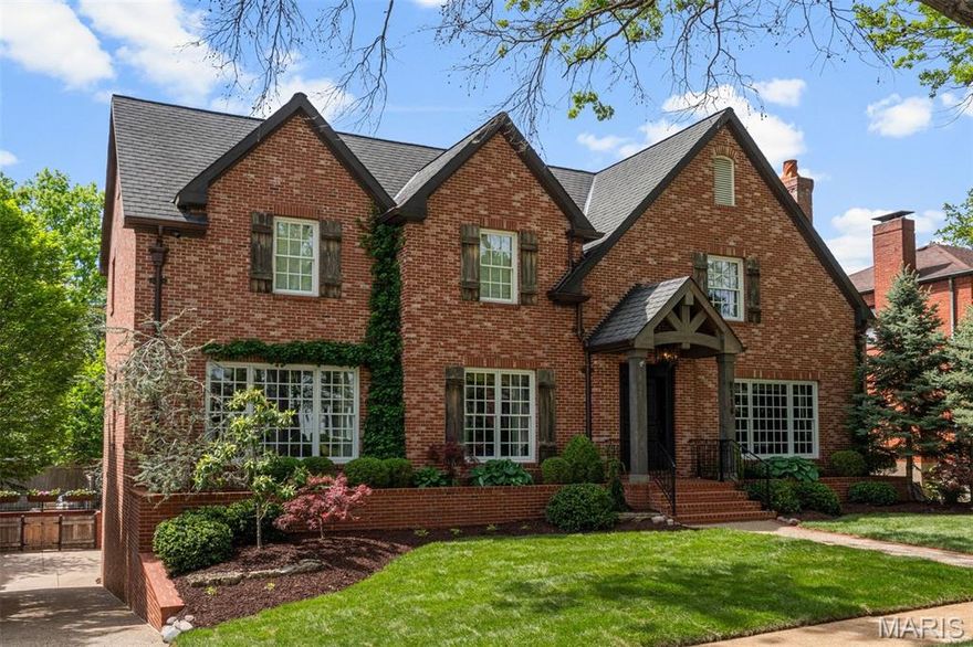 Enormous interest at Premiere event.  Multiple interested buyers.

A bespoke Clayton Gardens residence—designed for its original owner, not mass market construction.

Absolutely exceptional newer construction, now meticulously re-invented to evoke a refined yet relaxed mountain retreat aesthetic—warm, inviting, and effortlessly sophisticated. Perfectly positioned on an oversized, private lot, this home offers a rare combination of serenity, scale, and walkability in Clayton’s most coveted enclave.

A gracious entry unfolds to beautifully curated living spaces, including an elegant formal dining room with gas fireplace—ideal for intimate evenings or elevated entertaining. The designer kitchen is both striking and functional, featuring premium appliances, custom cabinetry and a signature one rough cut slab granite center island, all opening seamlessly to the breakfast and family rooms.

French doors lead to a covered veranda overlooking the resort-style pool and spa, creating a seamless indoor-outdoor lifestyle reminiscent of a luxury retreat.

A richly appointed library off the entry offers flexibility as a sophisticated home office or formal living room. The main-level primary suite is a true sanctuary, complete with dual walk-in closets and a spa-caliber bath with steam shower and refined finishes.

Upstairs, three expansive bedroom suites provide exceptional comfort and versatility, including a private suite with sitting area that easily functions as a second primary. A second-floor laundry adds convenience.

The walk-out lower level lives like a separate custom residence, featuring a spacious gathering room, private bedroom with adjacent bath, wine cellar, and direct access to a split 3-car garage—currently reimagined with one bay as an open-air fitness studio.

Wide-plank wood floors, expansive windows, and curated, top-tier finishes elevate every space. A near full-brick exterior not only enhances architectural integrity but offers long-term value and efficiency.

University Drive is regarded as Clayton Gardens’ premier street—offering immediate walkability paired with a quiet, tucked-away setting just beyond the energy of Maryland Avenue.

A rare offering where lifestyle, design, and enduring quality converge—crafted for those who expect nothing less than exceptional.