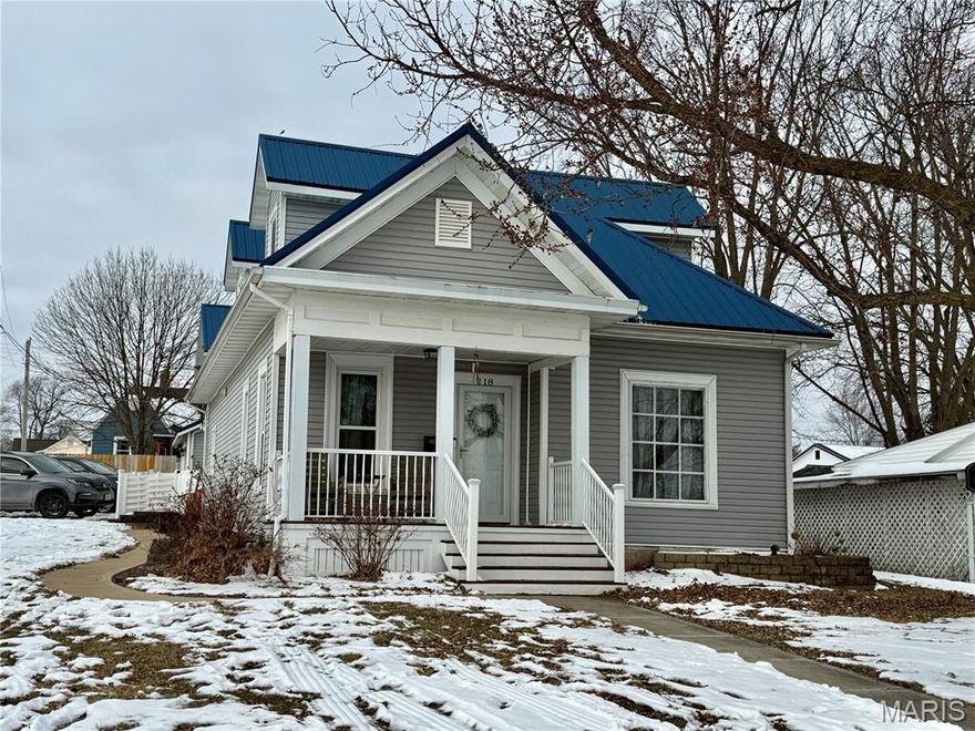 Step into this beautifully maintained home where classic charm and modern comfort seamlessly come together. Originally built in 1910, this home has been thoughtfully updated while preserving the character that makes it so special. Inside, you’ll find gorgeous wood trim, glass-paned doors leading into a bright home office, and new luxury vinyl plank flooring designed for both style and durability. The home offers 4 bedrooms and 2 full bathrooms, including a convenient main-level primary bedroom. The office provides flexibility and can easily be used as a playroom, nursery, or additional sleeping space. Main-level laundry is located just off the kitchen and includes a large walk-in closet currently used for storage and a pantry, offering plenty of room to stay organized. Outside, the fully fenced backyard is ideal for kids, pets, and family gatherings. Enjoy the beautiful courtyard between the home and detached garage—perfect for outdoor dining, relaxing, or hosting friends. A private section of the yard is set aside for pets or play space. The detached garage adds even more flexibility with a finished loft featuring mini-split systems on both levels. Currently used as a guest bedroom, this space is perfect for visiting family, a teen retreat, or a home studio, with water already available to add a future bathroom. Recent updates include a new metal roof in 2025 and new windows in 2017 for peace of mind. Conveniently located near Palmyra schools, this home offers the space, comfort, location and outdoor living everyone is looking for.