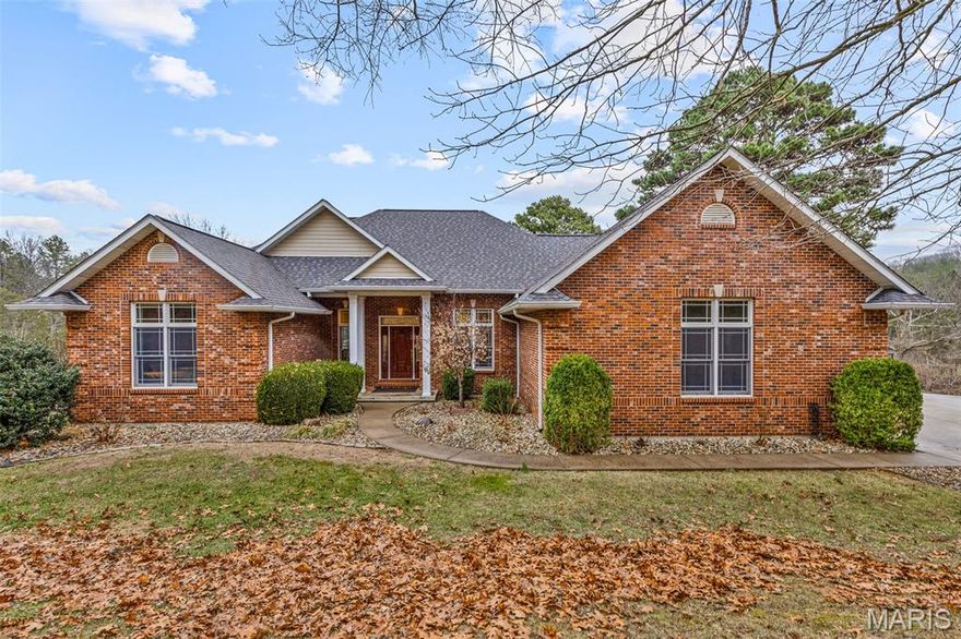 Private Lakefront Retreat on 15.3 Acres!
Tucked away in a serene, gated setting with only a few neighboring homes, this stunning 3 bedroom, 3 bath lakefront property offers the perfect blend of privacy, comfort, and recreation. Enjoy peaceful views of the spring-fed lake from the vaulted living room, where soaring ceilings and expansive windows bring the outdoors in.
The kitchen is designed for both everyday living and entertaining, featuring multiple islands, ample workspace, and all appliances included. Just off the main living area, you’ll find a large composite deck with plenty of space for your hot tub all overlooking the lake, along with a lower covered patio—perfect for hosting large gatherings or simply relaxing while taking in the water views.
The finished lower level adds even more living space with a spacious rec area, full bath, and cozy family room complete with a wood stove fireplace and bar—ideal for entertaining year-round.
Outside, enjoy 15.3 private acres complete with a boat dock/pavilion with electric and a floating dock for endless summer fun and swimming. The gated private drive is illuminated with commercial-grade lighting, adding both security and elegance. Additional highlights include a newer 7 Series Water Furnace system and a  30x50 detached garage offering abundant storage for vehicles, boats, or equipment.
If you’re seeking a private lake lifestyle with room to roam, modern efficiency, and incredible entertaining spaces—this one truly has it all. Schedule your private showing today!