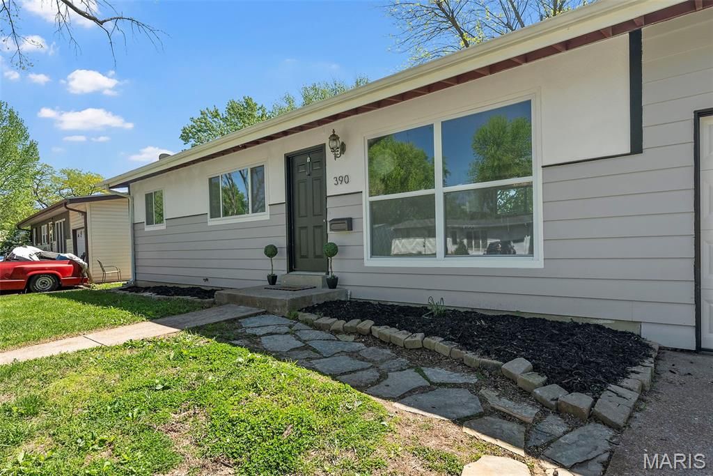 Photo of 390 Versailles Drive, Florissant, MO 63031 (MLS # 26024444)