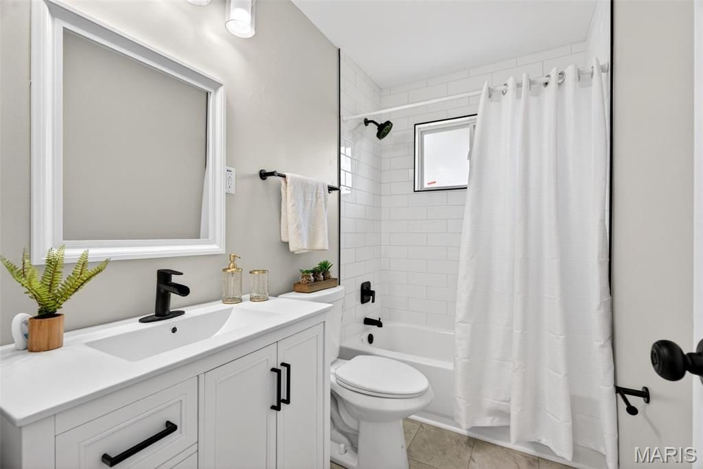 Photo of 390 Versailles Drive, Florissant, MO 63031 (MLS # 26024444)