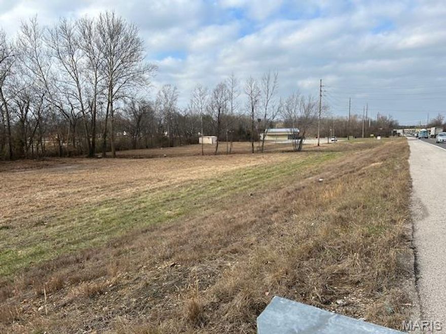 Level commercial lot with retail available, conveniently located just north of the intersection of US 50 and Highway 47.  2.8 acres of build to suit acreage that was previously a pre-owned automobile lot. Prime location with large daily traffic counts. Owner financing available.