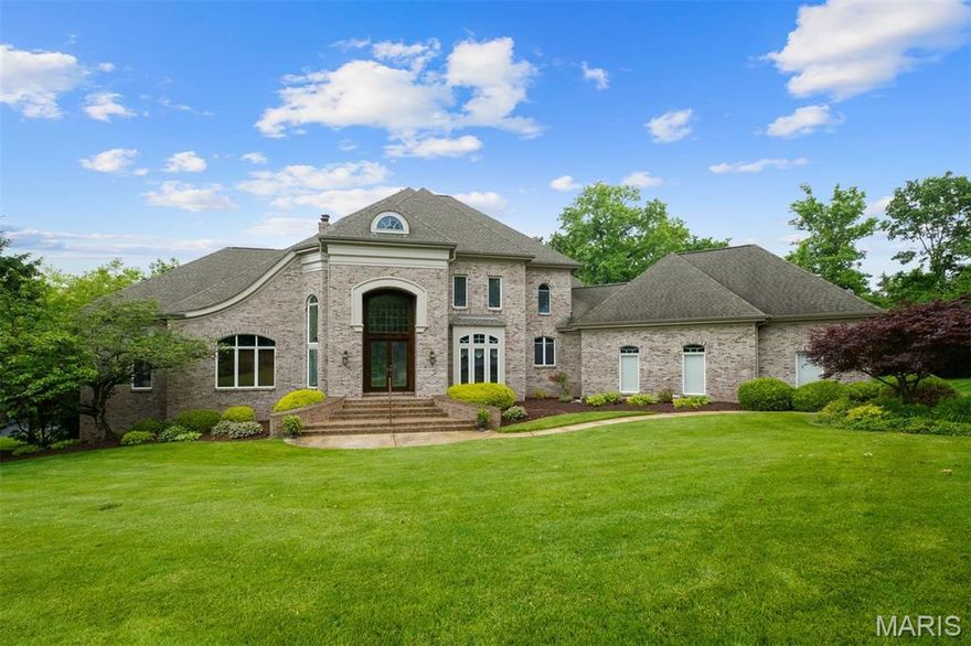 Experience luxury living in this stunning Johnson-built home on a private, landscaped acre in sought-after Hunters Pond. Located in the award-winning Ladue School District, this home is filled with natural light, soaring ceilings, and exceptional architectural details. The grand entry with floating staircase leads to formal living and dining spaces, a richly appointed study, and a custom kitchen with breakfast room and hearth room featuring a floor to ceiling stone fireplace. The main-floor primary suite offers a peaceful escape with sitting area, fireplace, and spa-inspired bath. Upstairs, three additional bedrooms and two full baths offers ample space for everyone. The finished walk-out lower level is perfect for entertaining, with a home theater, gym, guest suite, game room, and office. Step outside to a beautifully designed patio and sparkling pool, ideal for summer gatherings. Additional highlights include a 3-car garage, main-floor laundry, and ample storage. A rare blend of style, space, and location!