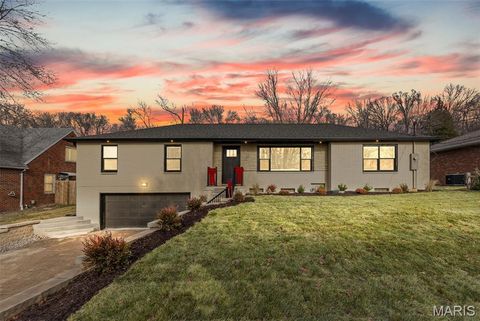 Photo of 24 W Woodland Drive, East Alton, IL 62024 (MLS # 25081856)