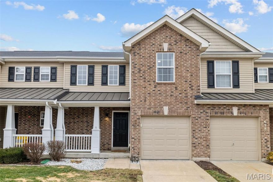 Welcome to this lovingly maintained and thoughtfully updated townhome in a great O'Fallon community! Brick accents and a covered front porch create curb appeal. The foyer leads you to the updated kitchen with granite counters ('25) and a full suite of stainless steel LG appliances ('23), plus a breakfast bar, integrated cabinet lighting, and oak-look vinyl plank flooring that continues throughout the living space. You'll love the vaulted living room with a view into the upper level and a palladian window above the sliding glass door. The modern lighting and neutral grey interior palette create a cohesive look connecting all of the spaces. The main-floor primary suite is perfect for convenient everyday living, complete with dual-sink vanity, jetted jacuzzi soaking tub, walk-in closet, and laundry room. The secondary bedroom and full bath located upstairs offer privacy for guests or workspace flexibility. You'll also have a loft, perfect as a family room or home office. The unfinished basement gives you opportunity to expand your living space with a rough-in for a bathroom and a walk-out. Enjoy all of the nearby amenities: community clubhouse, pool, playground, and tennis/pickleball courts. You'll be just moments from Wentzville Schools, with quick access to I-64 and all of the restaurants and shopping along Hwy N. This home is one you won't want to miss!