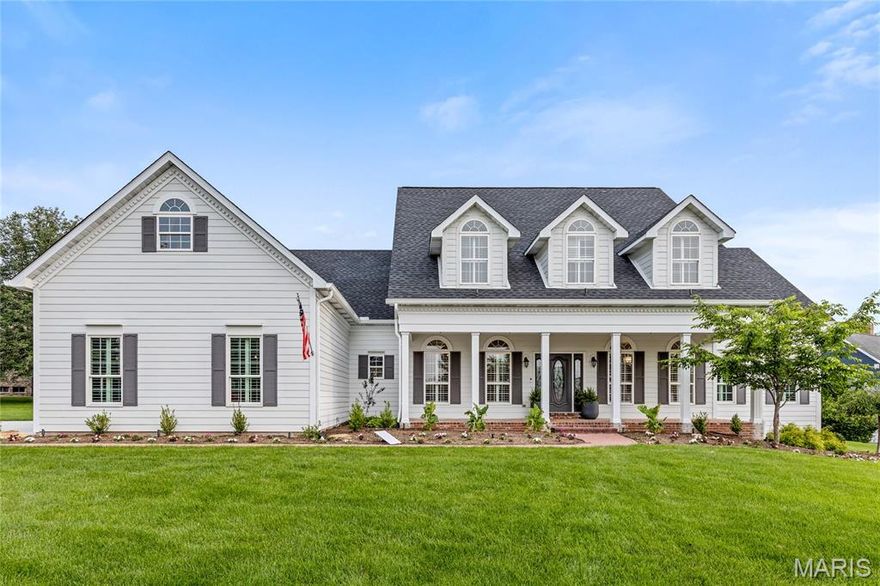 Extensively updated Southern Colonial situated on a .67-acre lot within prestigious Whitmoor Country Club. This 1.5-story home seamlessly blends classic architectural elegance with modern functionality. A stately brick front porch leads to a grand two-story foyer with hardwood flooring, flanked by a formal dining room and a private study—ideal for today’s professional lifestyle. The impressive great room features a floor-to-ceiling stacked stone fireplace, designer lighting, and a soaring wall of windows offering sweeping views of the manicured grounds and the 16th tee. The chef’s kitchen is appointed with 42” custom white cabinetry, quartz countertops, Viking stainless steel appliances, a large center island, and a built-in planning center. Adjoining the kitchen are a vaulted breakfast room and a sunroom with atrium doors opening to a beautifully designed outdoor living space. The main-level primary suite offers a serene retreat with a spa-inspired bath and a generous walk-in closet. The upper level includes three additional bedrooms, one with a private ensuite, and a full hall bath. The finished lower level features wide plank flooring, a spacious recreation area, and a game room. Additional highlights include a 3-car garage and extensive professional landscaping. An exceptional property offering refined living in one of the area's most sought-after communities. Award winning Francis Howell School District.