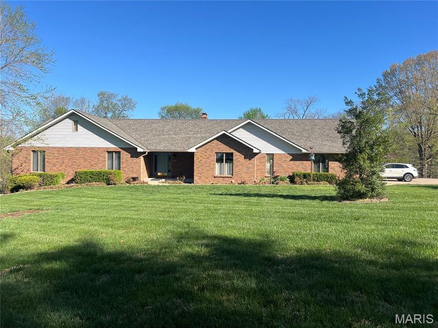 Meticulously maintained all-brick ranch situated on just over an acre, offering over 5,000 finished square feet of exceptional living space. This 4 bedroom, 3.5 bath home is designed for comfort and entertaining, featuring not one but two heated and cooled sunrooms overlooking the private backyard. Enjoy multiple living areas, two cozy fireplaces, and a layout that provides both openness and functionality.

The finished lower level offers incredible flexibility with a kitchenette—perfect for mother-in-law quarters, guest space, or extended stays. Step outside to multiple patios, a fenced yard, and an outdoor storage shed with electric, ideal for hobbies or extra storage. A spacious 3-car garage completes the package.

With an extensive list of updates over the past nine years, this home reflects true pride of ownership and offers space, versatility, and quality throughout.