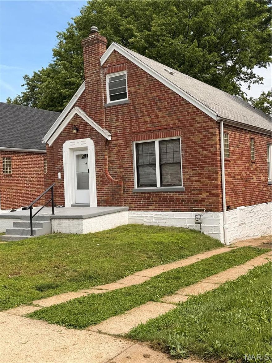 All brick home in a beautiful established neighborhood in historic St. Louis.  This house has great bones, and with a little TLC its true beauty will shine through!  2 beds on main level, sleeping room/den in partially finished basement.  Upstairs there is an open finished attic area.  Quick value add by adding one door and you have an instant 3rd bedroom and still a large bonus room area up there!  (Square footage does not include this space)  Super cute entry area and a large kitchen that is being under utilized.  Another value add opportunity!  The wood throughout the main level is in great condition.  Spruce up the bath, kitchen, and put a few finishing touches on the attic and basement and you have yourself a real charmer!  The details like arched door ways, stone fireplace, and stained glass/ glass block windows really make this home shine.  You'll also love the amount of natural sunlight that pours in.  If you're handy, or an investor, this is a wonderful opportunity to get into a home for an extremely affordable price!  One car garage and private drive for off street parking.  Home to be sold as-is, and buyer should verify all schools.