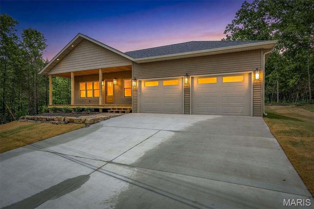 Photo of 649 N Lafitte Drive, Bonne Terre, MO 63628 (MLS # 26028563)