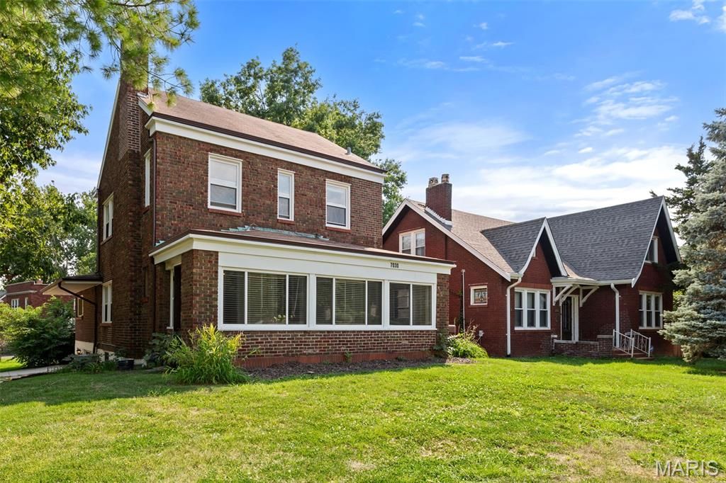 Photo of 7030 Clayton Road #A, Richmond Heights, MO 63117 (MLS # 26012790)