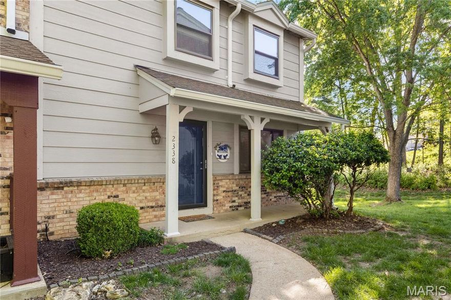 Welcome to this beautifully updated two-story townhome! This home features two spacious bedrooms, 2.5 baths, and a partially finished lower level with a separate laundry area, providing ample room for storage.  Recent upgrades include solid surface countertops in the kitchen, wood flooring throughout along with updated tiled bathrooms with new vanities and modern lighting. A separate dining room adds both function and charm. Gas fireplace in the living room for warm, cozy winter nights. Step outside to your large, private deck overlooking a beautiful wooded area! HOA amenities include a pool, tennis court, basketball hoop, and clubhouse. The monthly fee covers water, sewer, trash, and exterior maintenance. All appliances convey, including dishwasher, microwave, ss refrigerator, and washer and dryer. Ideally located near restaurants, shopping, and Queeny Park, with easy access to Highways 270, 141, 40, and 44, this home offers both comfort and convenience in a highly desirable area.