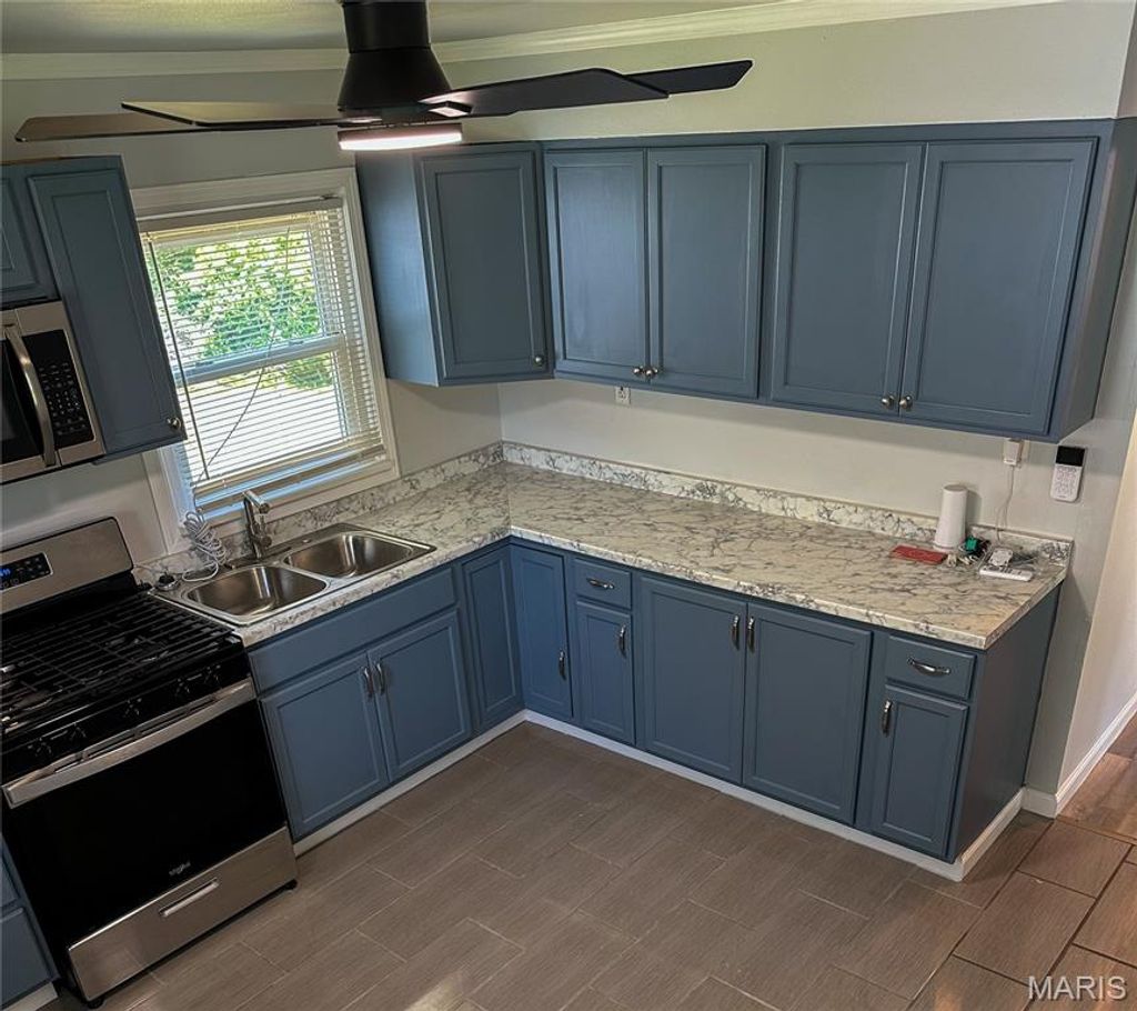Photo of 7207 Marge Avenue, Jennings, MO 63136 (MLS # 26029116)