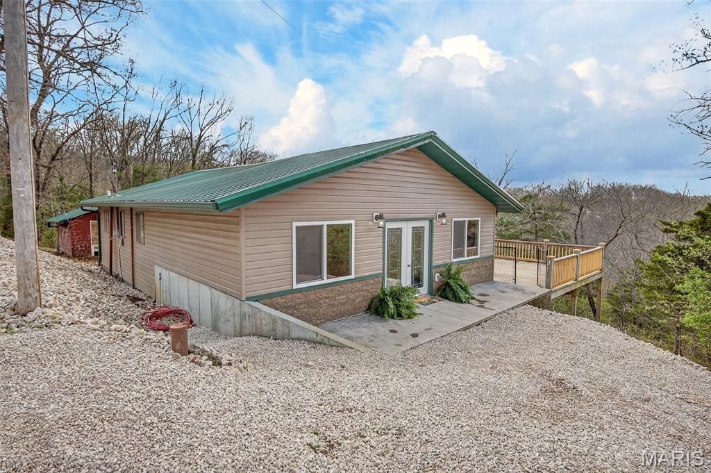 Photo of 89 Singing Oaks Drive, Sunrise Beach, MO 65079 (MLS # 26019627)