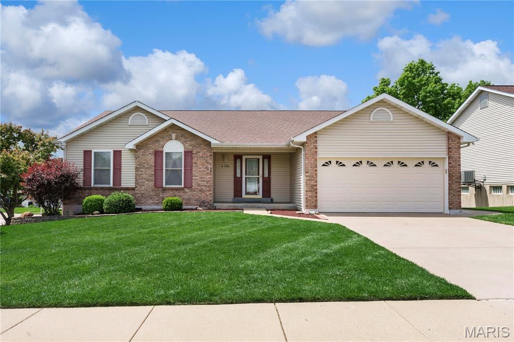 Photo of 1848 Summitview Drive, St Charles, MO 63303 (MLS # 26024883)