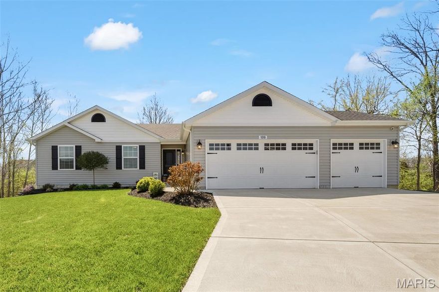 Tucked away on a quiet cul-de-sac in Wright City, this beautifully maintained 3-bedroom ranch offers the perfect blend of comfort, style, and privacy—backing to peaceful trees for a serene setting. Just 4 years young, this home feels like new and is filled with thoughtful upgrades throughout.
Step inside to a bright, open floor plan featuring a stunning living room with vaulted ceilings, a wall of windows that floods the space with natural light, and a cozy electric fireplace set against a stylish shiplap accent wall. The seamless flow leads into the dining area, highlighted by a charming bay window and direct access to the brand-new composite deck—perfect for relaxing or entertaining while enjoying the wooded backdrop.
The kitchen is truly the heart of the home, boasting stainless steel appliances, granite countertops, a breakfast bar, subway tile backsplash, and a spacious walk-in pantry. The fridge stays making the home truly move-in ready!
Retreat to the vaulted primary suite featuring a ceiling fan, walk-in closet, and private bath complete with dual sinks and a convenient utility closet. Two additional bedrooms, both with ceiling fans, share a full hall bath. You’ll also love the ease of main floor laundry.
Additional highlights include a 3-car garage, desirable Wright City Schools, and quick access to Hwy 70 for an easy commute. This one checks all the boxes—modern, move-in ready, and perfectly located!