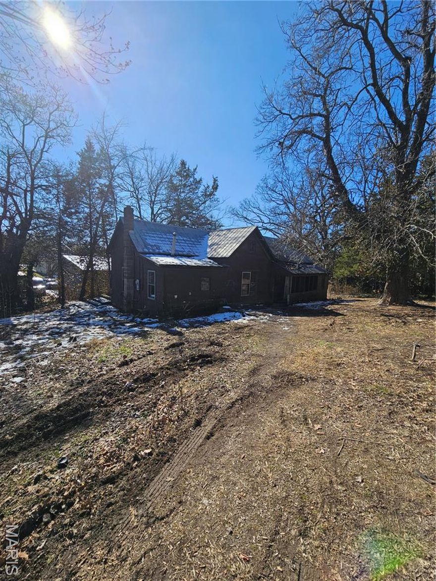 Investor opportunity with this ranch on 0.04-acre lot, set back from the main street for added privacy. Featuring solid bones and a manageable footprint, the home is ready for renovation, rental, or resale. Power is on, but other utilities are not and will not be turned on prior to closing—buyers should plan accordingly. With a quiet location and a property that’s truly a blank canvas, this home offers nothing but potential for the right buyer willing to invest sweat equity. A compact, value-add opportunity in a private setting, perfect for investors or buyers seeking a manageable project with upside.