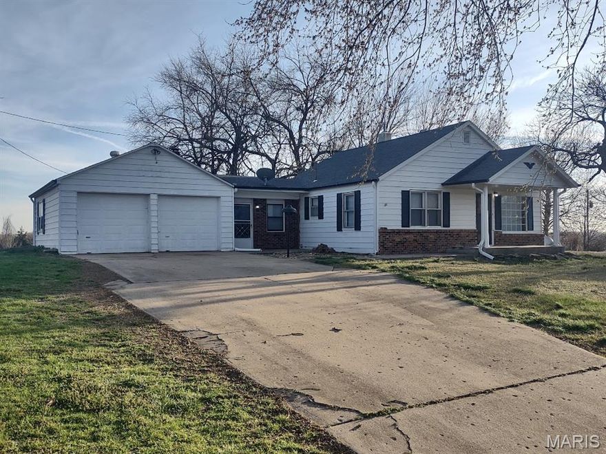 Income Generating Residential Property on aprox. 1.63 ac Corner Lot in Springfield, Mo. with COMMERCIAL DEVELOPMENT potential For Sale. 2 bedroom, 1 bath, dining and 2 living areas plus a wood burning fireplace and unfinished basement. Home has a back patio perfect for sunset grilling plus a concrete pad suitable for a basketball court. Large back yard and Shed could handle a horse, a couple calves or even goats. Located outside of city limits in Greene County Mo with access to Interstate 44 and US Highway 65, in the Northeast area of Springfield. Site is in an excellent location for a variety of Commercial and multifamily residential developments. Location also boasts convenient access to all of Springfield Missouri's amenities as well as one of the country's major interchanges....North to Sedalia, South to Branson, East to St Louis and West to Oklahoma.