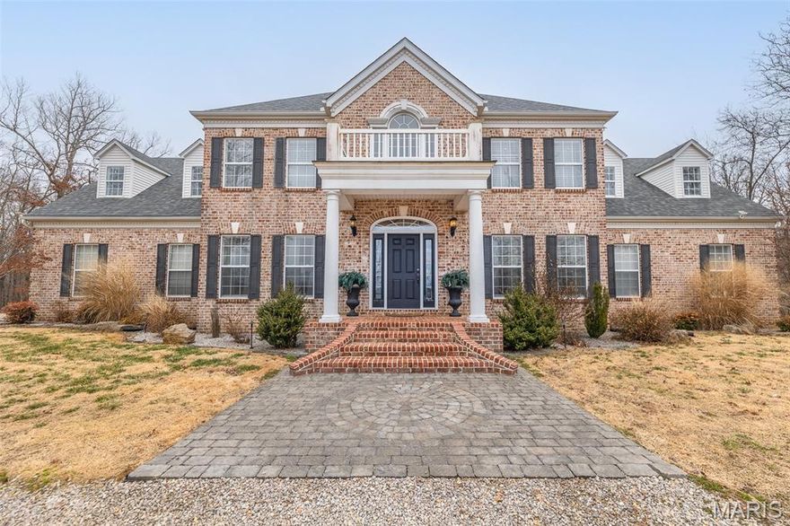Amazing curb appeal sets the tone for this stunning all-brick estate, perfectly positioned on a picturesque homesite with a sweeping drive. Offering over 6,000 square feet of beautifully updated living space, this 6-bedroom, 5-bath home seamlessly blends timeless design with modern comfort. Inside, soaring cathedral ceilings and abundant natural light create an impressive yet welcoming atmosphere. The spacious living area features a cozy gas fireplace, while the beautifully appointed kitchen showcases new appliances and a custom island that serves as the true heart of the home. Thoughtful upgrades throughout provide both style and peace of mind, including a whole-home water filtration system, new thermostats and updated HVAC motherboards, tinted living room windows, updated lighting and ceiling fans, custom blinds, and a custom-designed master closet system. The expansive full basement, complete with newly added concrete flooring, offers endless potential for additional living, recreation, or storage space. Step outside to your private backyard retreat featuring a newly built deck, pool, and hot tub—perfect for relaxing or entertaining. Extensive dirt work and professional landscaping have transformed the property, including extending the backyard by 15 feet and clearing approximately 50 trees to maximize usable space and open up the grounds. With its combination of size, upgrades, and resort-style amenities, this exceptional home offers luxury living at its finest.