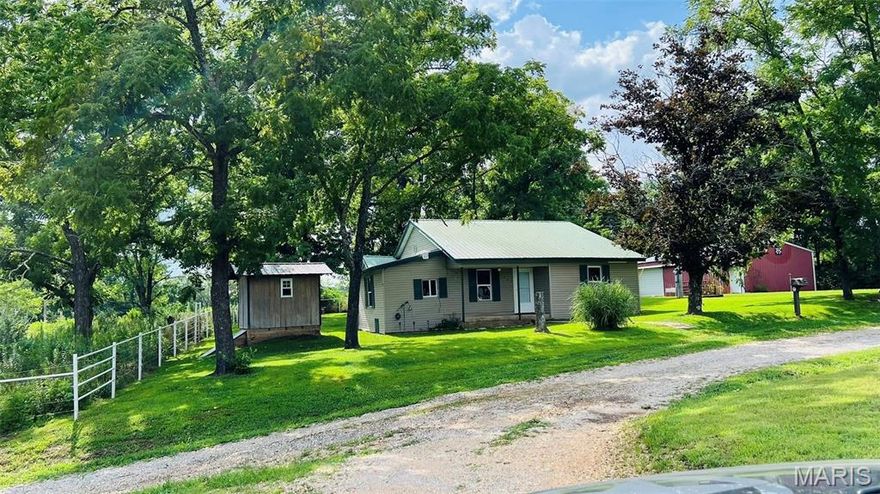 Experience the perfect blend of rural charm and in town convenience with this beautifully updated 2 bedroom, 1 bath, large utility room, and either a 3rd bedroom, of family room, farm home sitting on 4 acres m/l. Enjoy peace of mind with a security system and comfort year-round with two-energy efficient mini splits. Inside the home has been thoughtfully updated in 2021, offering a fresh move-in-ready feel. The property features a 20x30 insulated shop with concrete floors, perfect for projects storage or hobbies. Property has an outside storm shelter for storms, pipe fencing, and lots of shade trees to enjoy out in the yard. This rare find offers open space for gardening, animals, or simply relaxing, all while being conveniently located in the city limits of Summersville, MO. Property is just a short drive to the Ozark National Scenic Riverways, Current River, Alley Springs, Jacks Fork River, Rocky Falls and many other recreational areas and activities for your outdoor adventure. This property truly offers the best of both worlds - peaceful rural living with unparalleled access to recreation and adventure.