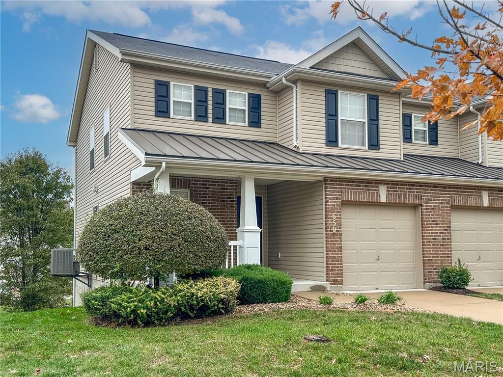 Photo of 650 Country Village Drive, Lake Saint Louis, MO 63367 (MLS # 25072769)