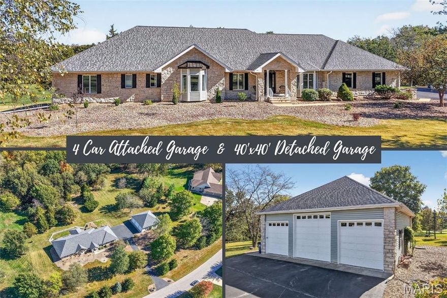 Luxury living meets serene country charm in this exquisite 3.55-acre estate! With nearly 7,000 finished square feet, this home blends sophistication and comfort throughout. The striking stone exterior with modern black accents and a new roof (2024) set the tone for what awaits inside. Step through the grand entry to gleaming hardwood floors, a formal dining room, and an elegant office with a bay window. The spacious living room features a gas fireplace and wainscotting, while the stunning four-seasons room offers peaceful views of the tree-lined backyard.

The gourmet kitchen is a chef’s dream—featuring abundant hickory cabinetry, a large L-shaped island with seating, walk-in pantry, custom built-in china cabinet, and convenient main-floor laundry. The main level hosts three generous bedrooms, each with its own fireplace, en suite bath, and walk-in closet. The impressive 26’x22’ primary suite includes a tray ceiling, dual vanities, soaking tub, separate shower, and a private water closet with bidet.

The fully finished lower level provides endless possibilities—complete with a full kitchen, bedroom, bathroom (updated in 2020), second laundry, and multiple living and recreation areas, ideal for entertaining or multigenerational living. The walkout basement opens to a screened patio and partially fenced yard.

Car enthusiasts and hobbyists will love the oversized attached 4-car garage plus a 40’x40’ detached garage with a 14’ center door and two 12’ doors - plenty of space for your RV, boats, trailers, or a workshop! Additional highlights include dual geothermal systems, 3 new water heaters (2024), new water softener (2024), new screens in LL screened patio (2025), new carpet in bedroom 2 (2025), and 400-amp service with extra 200 amp service in the detached garage.

This remarkable property offers luxury, privacy, and functionality—all just waiting to welcome you home.