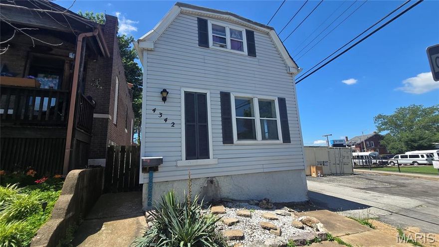 Opportunity awaits at 4342 Frieda Ave. in St. Louis! This move in ready 3 bed, 2 bath home offers plenty of potential for an owner-occupant or investor looking to build sweat equity while adding their own personal touches. A major highlight is the main-floor primary bedroom complete with its own private full bathroom, offering added convenience and functionality that’s hard to find in homes of this style and price point!

The kitchen features stainless steel appliances and opens into the main living areas, creating a practical layout for everyday living. Upstairs, you’ll find two additional bedrooms connected by a versatile flex space that could serve as a home office, reading nook, playroom, or secondary living area. The rear upstairs bedroom opens directly onto an attached deck and stairwell that leads to the backyard, adding unique character and outdoor accessibility.

Additional updates include an HVAC system installed in 2025 for added peace of mind. Outside, the oversized 3-car garage is a true standout feature — ideal for extra vehicles, storage, workshop space, or hobby use. Conveniently located near shopping, dining, parks, and major highways, this property offers strong potential and plenty of room to make it your own!