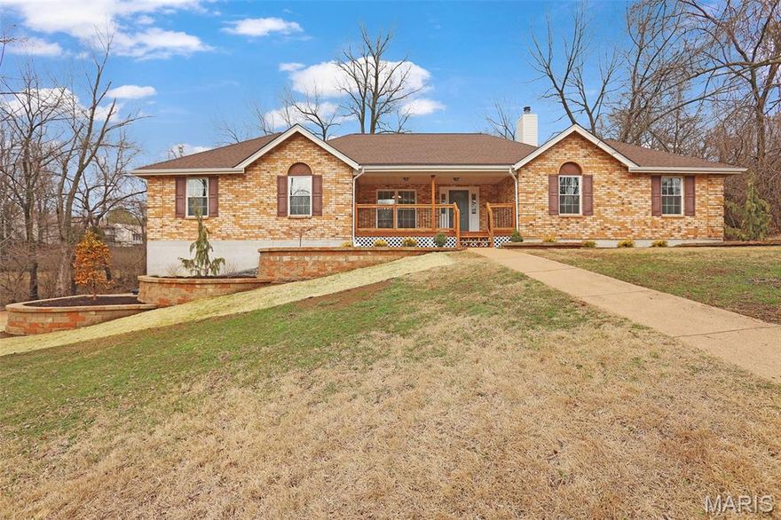 It doesn't get more turn key than this. Beautifully updated ranch on a private, tree-lined lot. This home offers exceptional curb appeal with a brick facade, welcoming covered front porch, and large concrete driveway. Inside, you'll find a bright, open layout with fresh neutral paint, new laminate wood flooring, and abundant natural light throughout.

The main living areas feature vaulted ceilings, oversized windows, and a stunning brick fireplace that anchors the space. The fully renovated kitchen showcases white cabinetry, updated hardware, built-in wall oven, ample storage, and granite countertops. Home has 5 large bedrooms with each one containing a walk-in closet. Bathrooms have all been redone, with the master housing a double vanity. Basement has been partially finished to provide extra living space. However, the majority of the basement is unfinished and offers abundant storage space. Leave the walk-out basement and you'll notice the fenced in back yard, new vinyl siding, and new garage doors.

This is as close to a new build as it gets. The following renovations have recently been completed: new gas furnace, new air conditioner, new roof, new windows throughout, new laminate wood flooring, new carpet in bedrooms, fresh paint, new granite countertops in kitchen, new kitchen cabinets, new Frigidaire appliances (dishwasher, cooktop, fridge, oven), new bathrooms, new vinyl siding, and new garage doors, Come check this one out before it's too late!