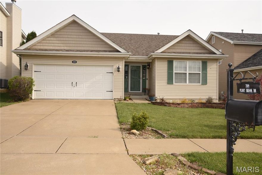 Amazing price adjustment.  Don't miss your chance to call this one home. Set up your appointment to see this one today! Pride of ownership shows in this lovely four-bedroom, 3-bath ranch that has been impeccably remodeled. This home is much larger than it appears, with almost 2300 total square feet.  When you enter, you will see where quality meets value.  Valuted ceilings adorn the great room, primary bedroom & dining room & kitchen. This home has newer luxury vinyl plank flooring, newer tile flooring in all bathrooms, and newer fixtures throughout. The first two bedrooms just down the hall, along with the hall full bathroom, are all nice-sized.  The great room is spacious with a marble gas fireplace with an open concept into the dining room, which has a walk-out bay. The kitchen has 42" cabinets and a newer backsplash. Main floor laundry. The primary bedroom has an expansion to the back of the home and is extra large with double windows, which are tilt-ins and insulated. The Primary bath has newer tile flooring, an adult-size double sink, and newer fixtures. The lower level also has the luxury vinyl plank flooring and beautiful fixtures.  Extra-wide hallways.  Huge full bath with walk-in shower.  Spacious 4th bedroom with egress window. The family room is a comfortable, great space for everyone to hang out and watch TV. The bar is negotiable. There's also a large storage area with a barn door.  Newer roof (2024) and water heater. 2-car garage. The backyard patio and vinyl-fenced yard are great for the family BBQs with a newer gazebo.  Roof (2024), Newer 50-gal water heater, updated fixtures already set up for radon.  Don't miss this beauty.