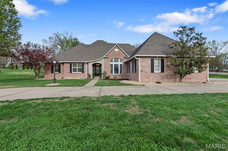 Welcome to this stunning brick and stone masterpiece, perfectly positioned on a picturesque corner lot with mature, manicured landscaping and a stately circle drive that sets the tone from the moment you arrive.

Step inside to discover soaring ceilings, light-filled spaces, and a layout designed for both everyday comfort and effortless entertaining. The heart of the home features a spacious eat-in kitchen complemented by a formal dining area, perfect for gatherings both large and intimate.

The expansive main-level primary suite is a true retreat, offering generous space and privacy.

And the timing couldn’t be more perfect… just in time to move in and spend your summer poolside. Step right out from the main level into your own private oasis… complete with a sparkling saltwater pool, covered patio for shaded lounging, and a charming gazebo that feels like a vacation at home.

Downstairs, the mostly finished walk-up basement offers incredible versatility with a full bar, large family room, and two additional flex spaces ideal for a home office, gym, guest quarters, or hobby rooms.

With a 3-car garage, thoughtful design throughout, and indoor-outdoor living that truly shines, this home blends elegance, comfort, and lifestyle in one unforgettable package.

Move in, make a splash, and enjoy every moment of summer right at home.