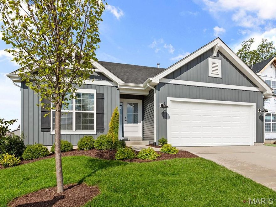 McBride Maple ranch-style home w/3BR, 2BA will be move-in ready this spring! Farmhouse exterior & walkout homesite! Perfect for entertaining with an open floorplan, vaulted ceilings, a spacious living area with a ceiling fan, 6’ windows & wood laminate flooring. The kitchen features Burlap 42” tall cabinets, large center square island with a breakfast bar, quartz countertops & stainless-steel GE appliances. Indulge in the large primary suite with a walk-in closet, private bath with adult height double sink vanity, linen closet, & 5ft walk-in shower. Enjoy white 2-panel interior doors, main floor laundry, and a ¾ bath rough-in in the lower level. Additional features include garage coach lights at two car garage & more! Blvd at Wilmer Valley amenities include a playground, covered pavilion, gazebo walking trails and common ground. Enjoy peace of mind with McBride Homes’ 10 year builders warranty and incredible customer service! Similar photos shown.