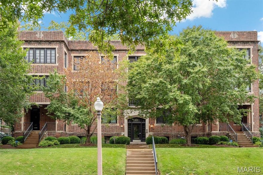 Live in the cultural center of St. Louis in this immaculate, 2-bedroom (could easily convert back to 3bd), 2-full-bath, 3rd-floor walk-up condo in the heart of the West End. With a lovely private outdoor patio, in-unit laundry, and gated, secured garage parking for 2, this stands alone. The kitchen boasts an enormous island, granite countertops, custom cabinets, stainless-steel appliances, and a custom wine fridge. The kitchen is completely open to the dining area, and the incredible living room has a gas fireplace with a TV hookup, exposed brick, and loads of windows with unobstructed views and natural sunlight. The primary suite is a sanctuary, with dual vanity sinks, an oversized shower, and a large, organized walk-in closet. The current dedicated office is generous and ready for your hobby or career, formerly the 3rd bedroom. Beautiful hardwood floors, recessed lighting, energy-efficient windows, and quality HVAC. Minutes from Barnes/Jewish Hospital and the Cortex. Location: End Unit, Upper Level.