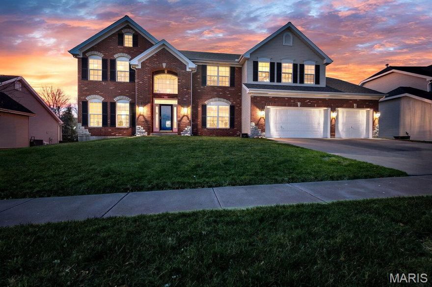 Welcome Home to the Villages of Bainbridge located in the Heart Of Dardenne Prairie where you will find a  Stunning 4 Bedroom, 5 Bathroom Home (3 Full Bath, 2 Half Bath). Boasting Neutral Decor, Hardwood Flooring, Newer Blinds. This BEAUTY offers over 4,600 sq ft of Living Space and is loaded with Upgrades throughout. Enter into an impressive Two Story Foyer. The Main Level features a Formal Dining Room, Expansive Family Room with Gas Fireplace and Bay Window.  The Chef's Spacious Kitchen is complete with Freshly Painted White Cabinetry, Center Island, Newer Stainless Steel Appliances,Double Ovens, Built In Microwave, Pantry, Planning Desk, and adjoining Breakfast Room. Convenient Main Floor Laundry includes a Utility Sink. Enjoy the addition of A Whole-Home Intercom System and Central Vac adding comfort and functionality. Upstairs, you’ll find a Bonus Room, an Oversized Primary Suite with a luxurious En-Suite Bath featuring Double Sinks, Garden Tub, and Separate Shower.  Additionally, Bedrooms 2 and 3 share a Jack & Jill Bath, while Bedroom 4 is conveniently located near a Full Hall Bath.
The Finished Lower Level is designed for Entertaining with Custom Lighting, Entertaining Wet Bar, Game Area (Pool Table Included), Half Bath,  Fully Equipped Home Theater with Seating, Projection Screen, and Receiver.
The Oversized 3-Car Garage includes an Attached Insulated Workshop. Step outside to enjoy the Level Fenced Yard, Irrigation System, Outside Surround Sound,and Large Patio—perfect for creating your own Backyard Oasis. Dual Heating & Cooling/ Two Water Heaters. Enjoy the Luxury of a Subdivision Pool. This is a MUST SEE!