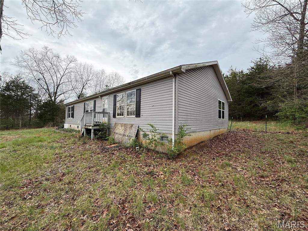 Photo of 3908 Flucom Road, De Soto, MO 63020 (MLS # 26019721)