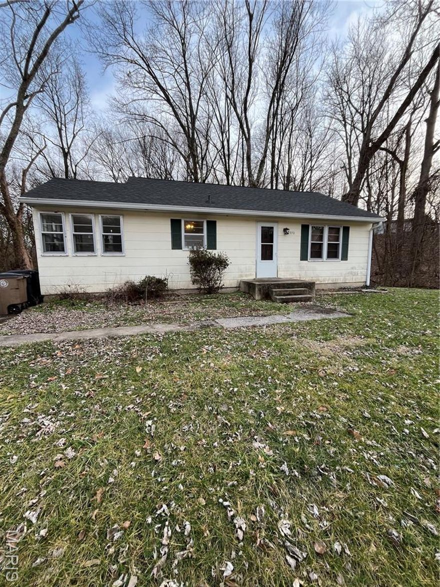 Enjoy hardwood floors and a dry basement ideal or storage or workshop in this solid two-bedroom residence. The property sits on an expansive lot, offering plenty of outdoor space for gardening or entertaining, perfect for expansion or play! Downsizing or starting out this property is for you!