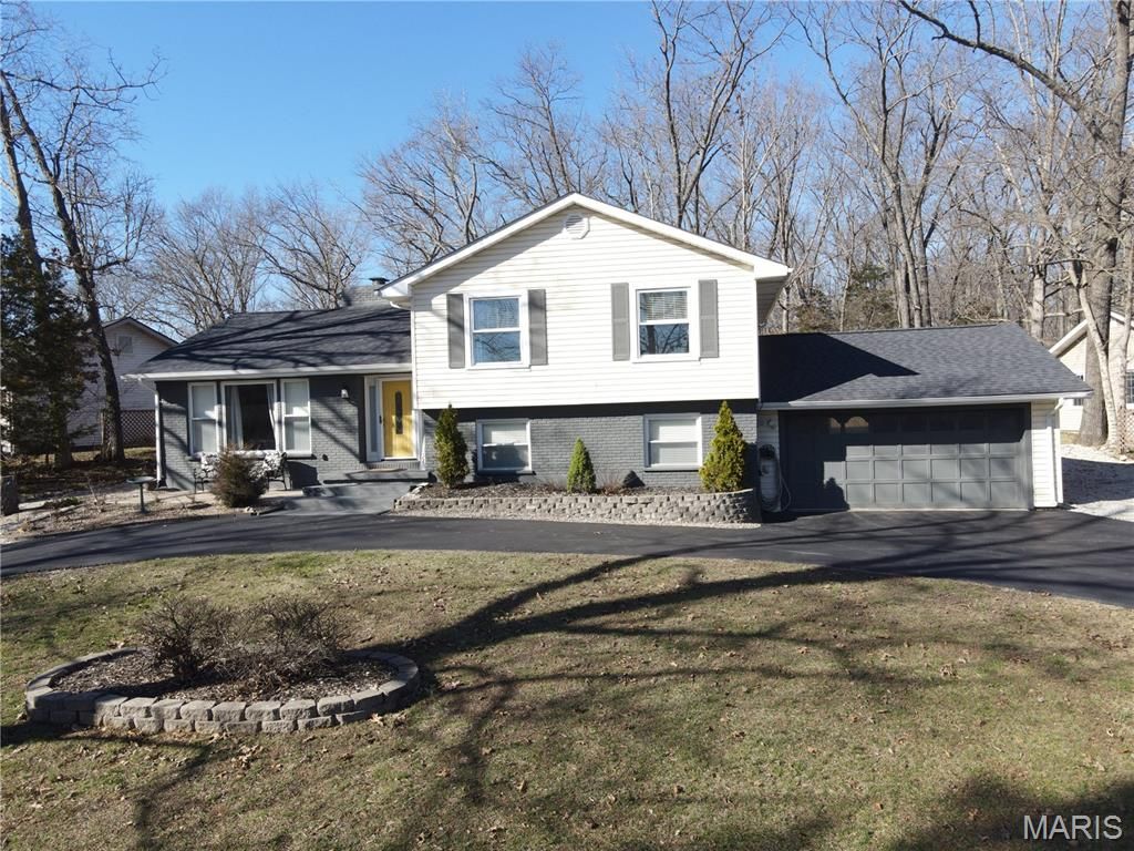 Photo of 5697 Lake Tishomingo Road, Hillsboro, MO 63050 (MLS # 26013489)