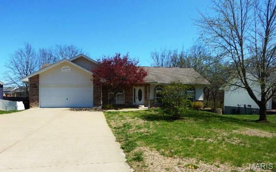 Spacious and open ranch style home with so much to offer! Main floor has great room with fireplace, dining area, kitchen with island and main floor laundry. Special features include: wood floors, vaulted ceilings, four bedrooms, three baths, deck off the back and fenced yard. There are two levels of living, lower level has bedroom, full bathroom and family room. Primary bedroom suite has full bath with a separate tub and shower. The basement is a walk out to a patio area and a deck with a partially fenced yard. This house is ready for the new owner. Easy to show, set your appointment today!